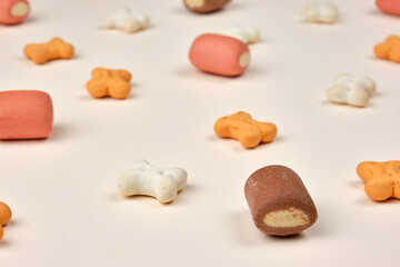 Dry pet food isolated on light background 