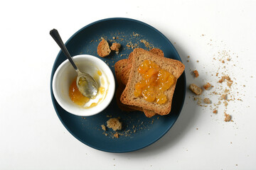 apricot jam with rusk for breakfast - closeup