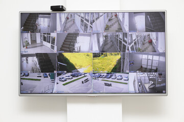 CCTV security system with multiple camera views in office building. Surveillance security system,...