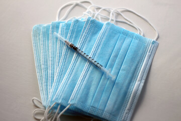 face mask and syringe