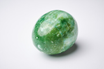 Jade stone green gemstone with shape of egg, semiprecious jewelry chinese souvenir related to massage and fortune © Ricardo