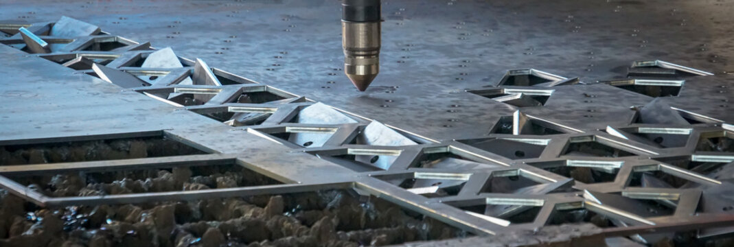 CNC Laser cutting of metal, modern industrial technology.