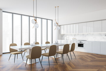 Modern white and beige kitchen and dining room corner