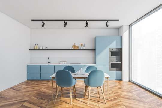 Modern white and blue kitchen interior