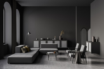 Dark living room interior with armchair and sofa, drawer and windows