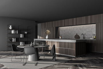 Dark grey and wooden kitchen corner with bar and round table