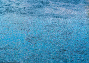 Dark water with sun river surface reflections