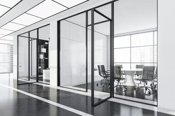 Black and white conference room interior with furniture and window