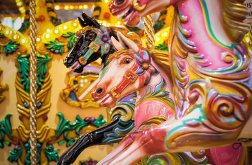 Fototapeta na wymiar Carousel, merry go round, at Christmas funfair Winter Wonderland in London