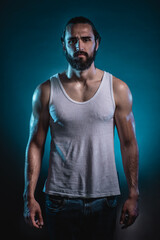 Fototapeta na wymiar Studio portrait of a beautiful masculine bearded man 