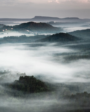 Morning foggy landscape viewed from Mariina sk&aacute;la (Marienfels), Bohemian Switzerland, Czechia