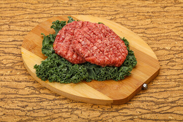 Raw beef burger cutlet for cooking