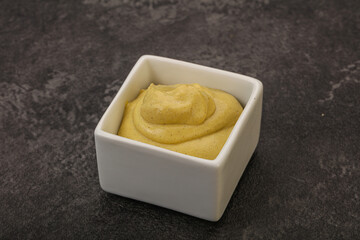 Dijon mustard sauce in the bowl
