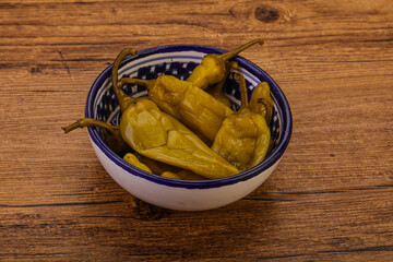 Marinated spicy and hot green pepper