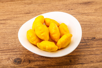 Marinated patissons in the bowl