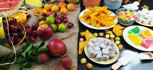 fresh fruits and unhealthy foods for healthy eating
