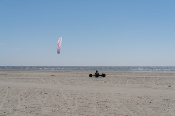 Obraz premium kite buggy enjoying a windy day on the Wadden Sea island beaches of western Denmark
