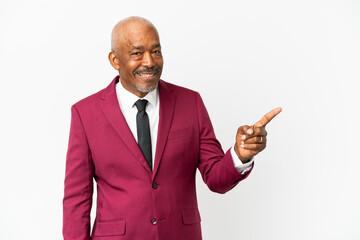 Cuban senior isolated on white background pointing finger to the side