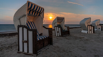 Beach Chairs with moonlight over the beach in Thiessow, Mecklenburg-Western Pomerania, Germany