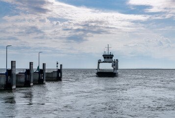 view of the Feggesund ferry leaving the harbor in Thy © makasana photo