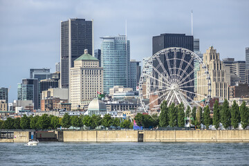 Gorgeous skyline of Montreal city as seen across the St. Lawrence River. Montreal, Quebec, Canada.