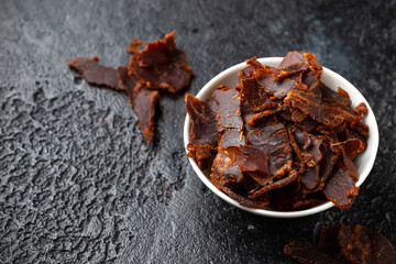 Dried Beef Jerky snack in white bowl