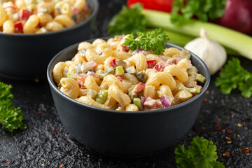 Macaroni Salad with red bell pepper, onion, celery, gherkins and mayonnaise dressing