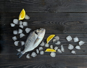 The omega-3 fatty acids in fish  dorada are good for your heart,  with copy space, top view