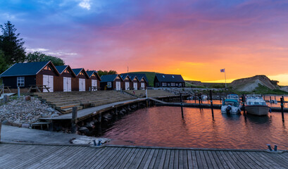 colorful sunset over the small marina and harbor at Ejerslev Lynd in northern Jutland © makasana photo