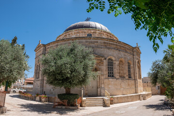 Naklejka premium Ethiopian Orthodox church named the Kidane Mehret Church, located in Ethiopia street in Jerusalem. The biggest and the most distinctive Ethiopian site at the holy land. Olive tree at the foreground.