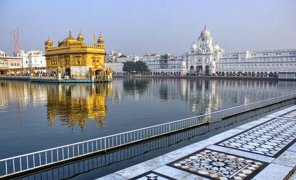 Golden temple harmandir sahib most sacred place for Sikh devotees surrounded with holy pond at day time location in Amritsar, state of Punjab in Northern India, Asia