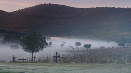 Morning fog over Sad Hill Cemetery. Tourist place in Spain.