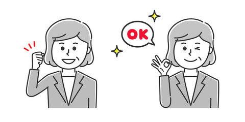 The office worker wearing a suit raised her fist and made an OK sign.