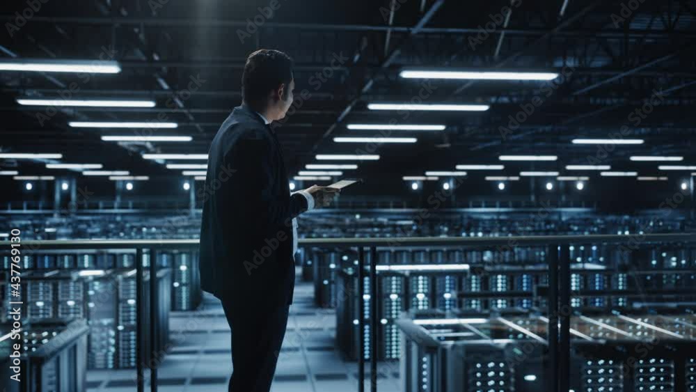 Aufkleber Portrait of IT Specialist Using Tablet Computer in Data Center. Big Server Farm Cloud Computing Facility with Male System Administrator Working. Cyber Security, Network Protection. Full Wide Arc