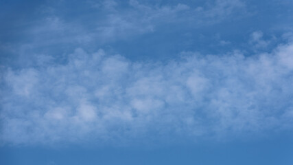 Obraz premium Altocumulus clouds in blue sky. panorama clouds image 