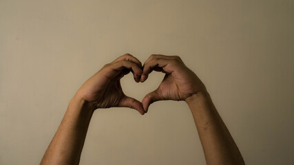 Fototapeta premium man hands making common and youth trend gesture and signs of peace love and fight and science fiction