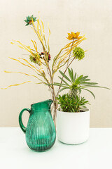 Decorative pot, flowers and palm