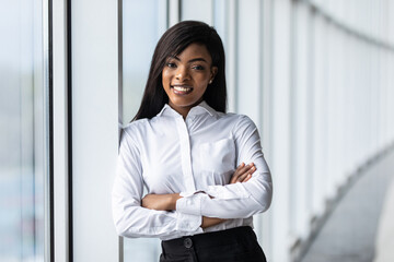 Portrait of young business woman in modern office