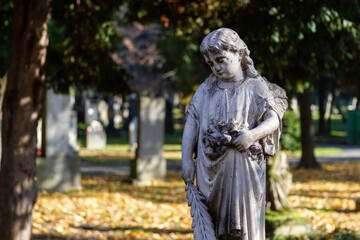 A statue of an angel on an ancient tombstone at the Ondrejský cintorín (St. Andrew's Cemetery) in...