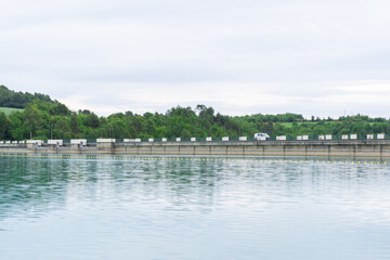 View of a car crossing over the swamp dam