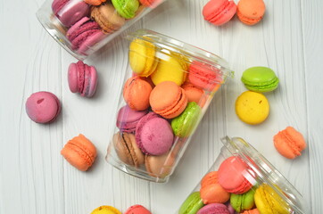 traditional french colorful macarons in a rows in a box