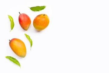 Mango with leaves on white background.