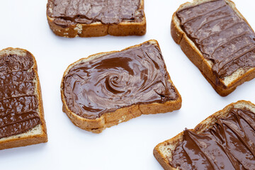 Bread with sweet chocolate hazelnut on white