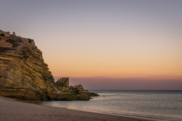 Colorful sky at morning before sunrise at praia da Figueira, Portugal