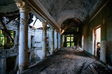 Fototapeta na wymiar Interior of old ruined abandoned theater