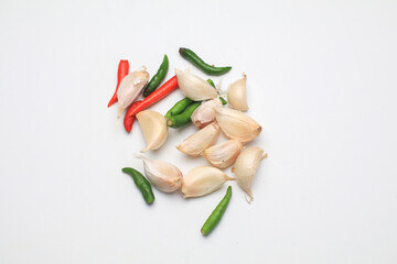 Garlic and chili for cooking food. Isolated on white. copy space. Cooking spicy ingredient.