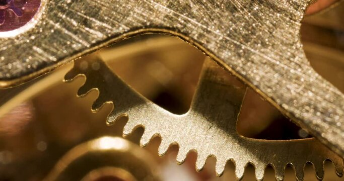 Old retro vintage clock watch mechanism close-up details, Ratchet spring, gear