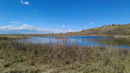 Storm ponds near the community of Cranston in Calgary, Alberta. Storm ponds capture and hold water to settle out sediments and pollutants before it goes into the river. 