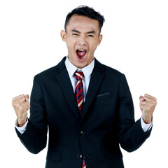 Young attractive asian business man wearing black suit with white shirt and necktie yelling and looking confident. Put his fists out to cheer up on white background isolated