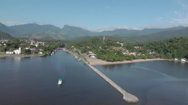 Rio Pereque enters Atlantic in sleepy colonial town of Paraty, Brazil
